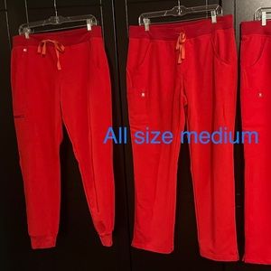One pair- women’s Medium Joggers- pop red